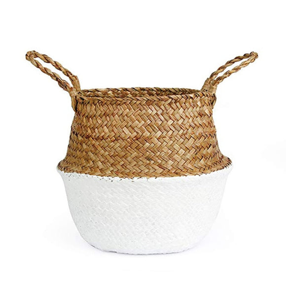 Seagrass basket with the bottom half painted white.
