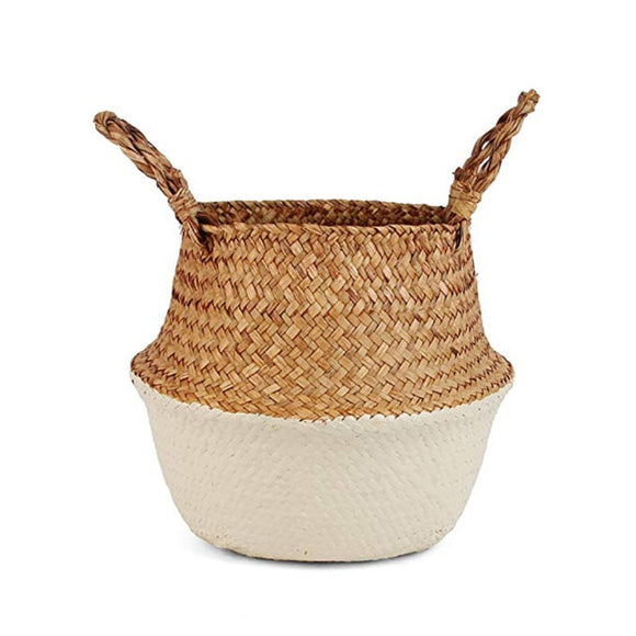 Seagrass basket with the bottom half painted beige.